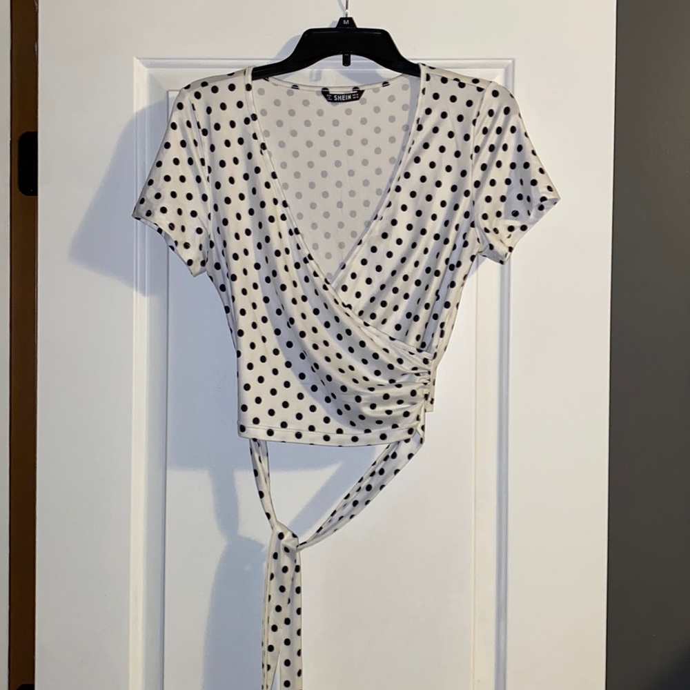 Super cute. Very soft material,polyester and spandex'